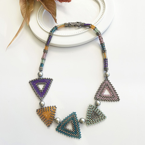 トリアンゴロ パズルネックレス／パステル